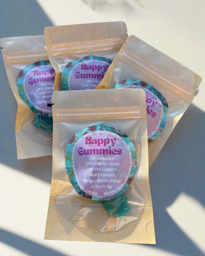 Hand-made botanical gummies arranged in eco-friendly packaging for mindful self-care