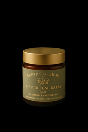 Jar of Earth's Alchemy CBD Ritual Balm on a black background