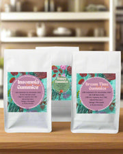 Three bags of gummies with colorful labels on a green and yellow background